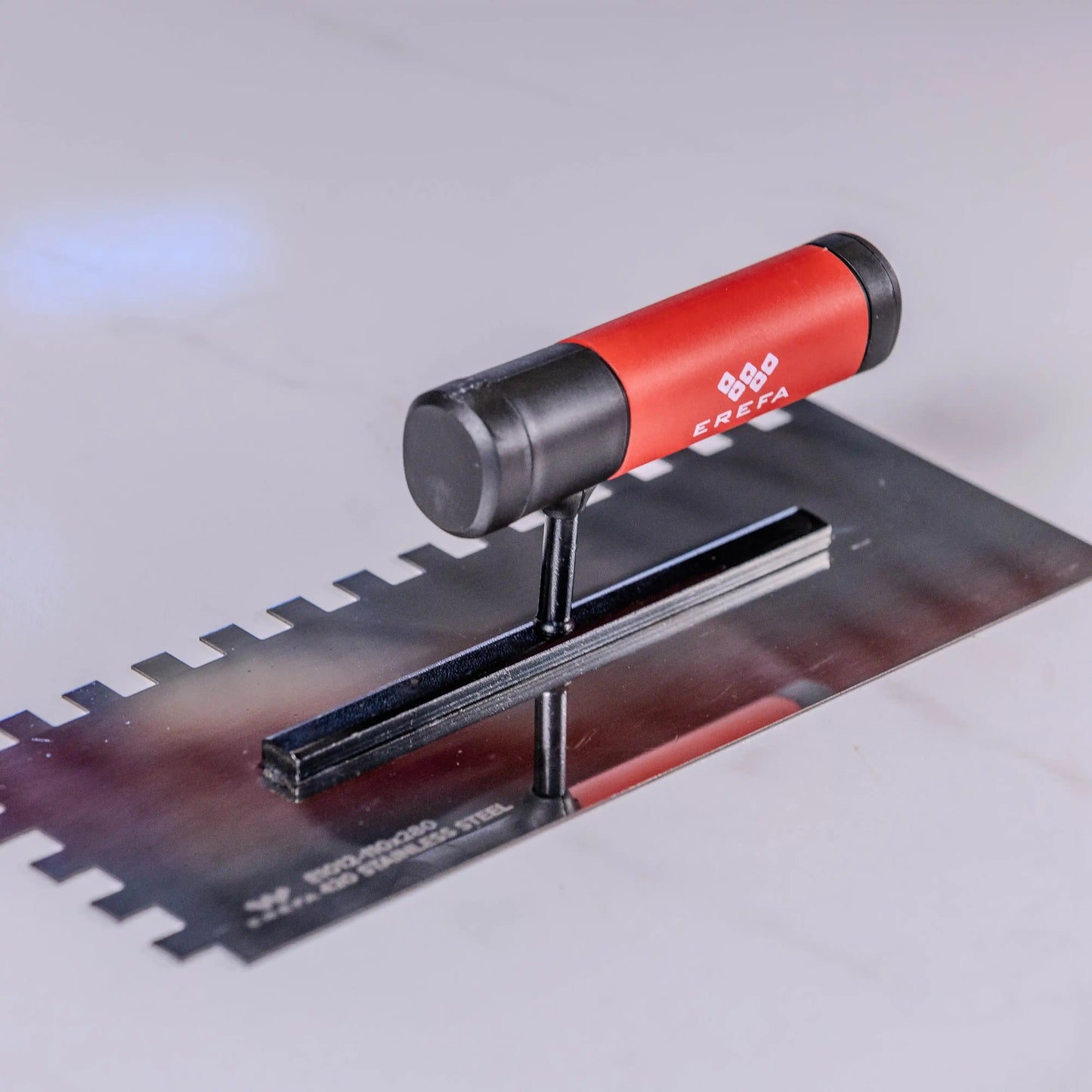 E1012 Inox gletarica sa zubima 10mm (110x280mm)